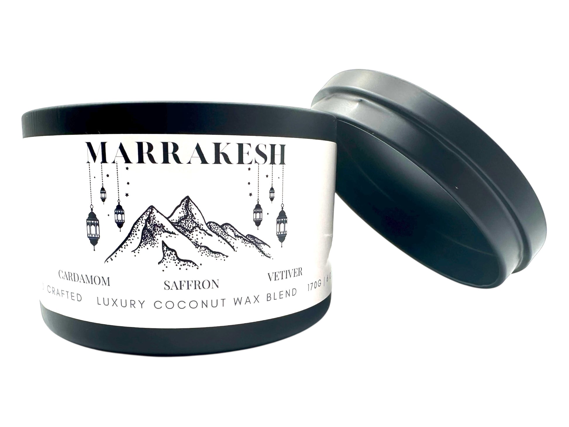 A black candle tin labeled "Marrakesh" lid removed  on a white background. 