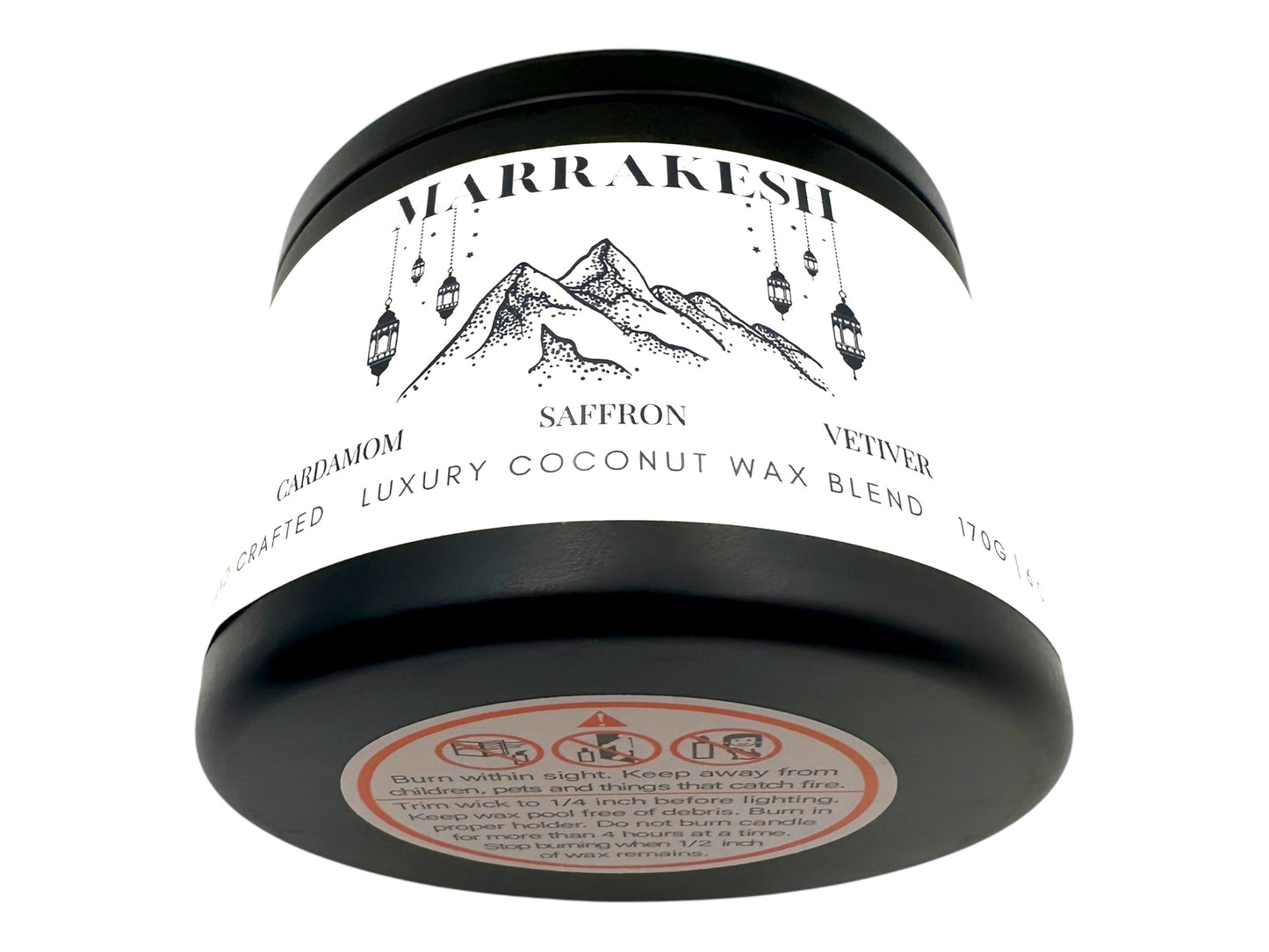 A black candle tin labeled "Marrakesh" on a white background. 