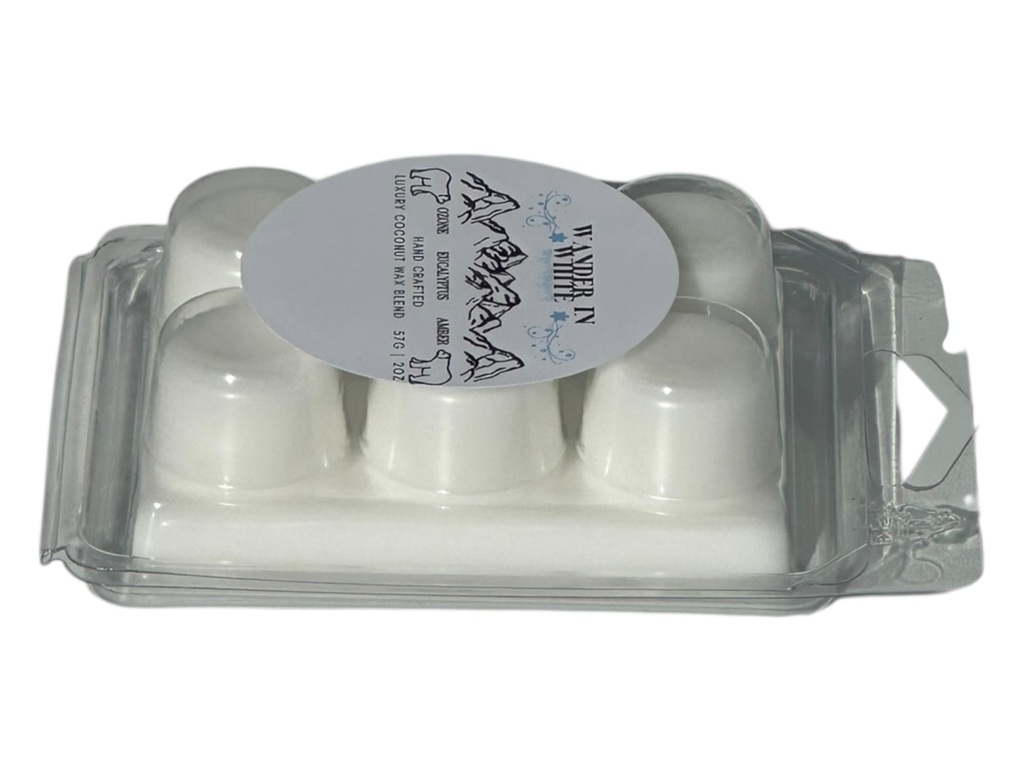 A winter wax melt labeled "Wander in White" in a clear clamshell with a glossy printed label on a white background side view to show depth of clamshell.