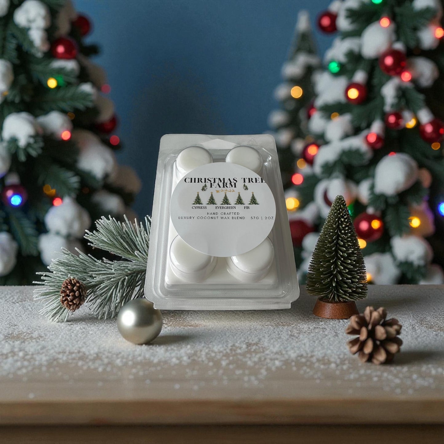 A holiday wax melt gift labeled "Christmas Tree Farm" on a wooden surface with Bright colored twinkling lights on Christmas trees in the background.