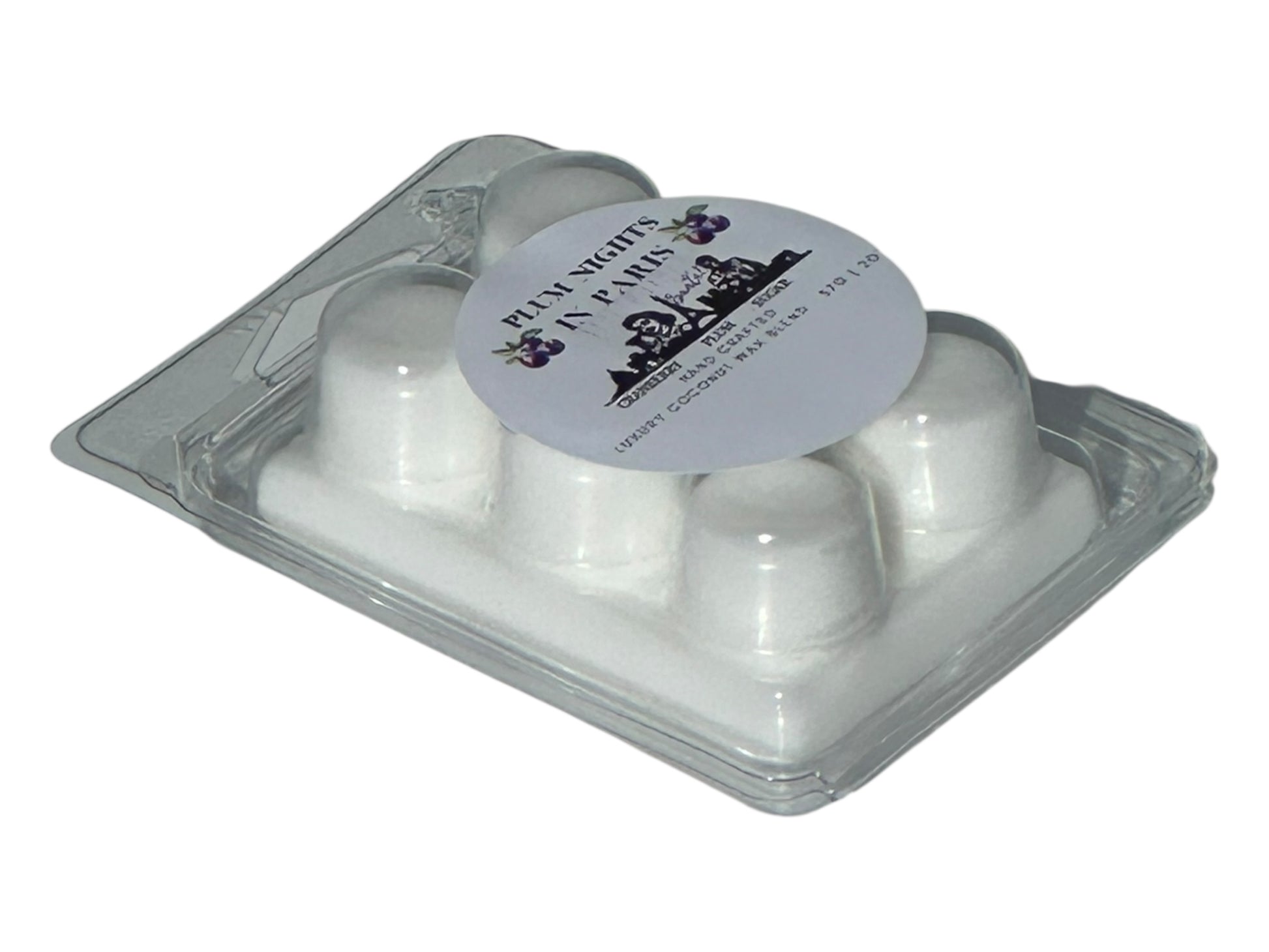 A holiday wax melt labeled "Plum Nights in Paris" on a white background side view.
