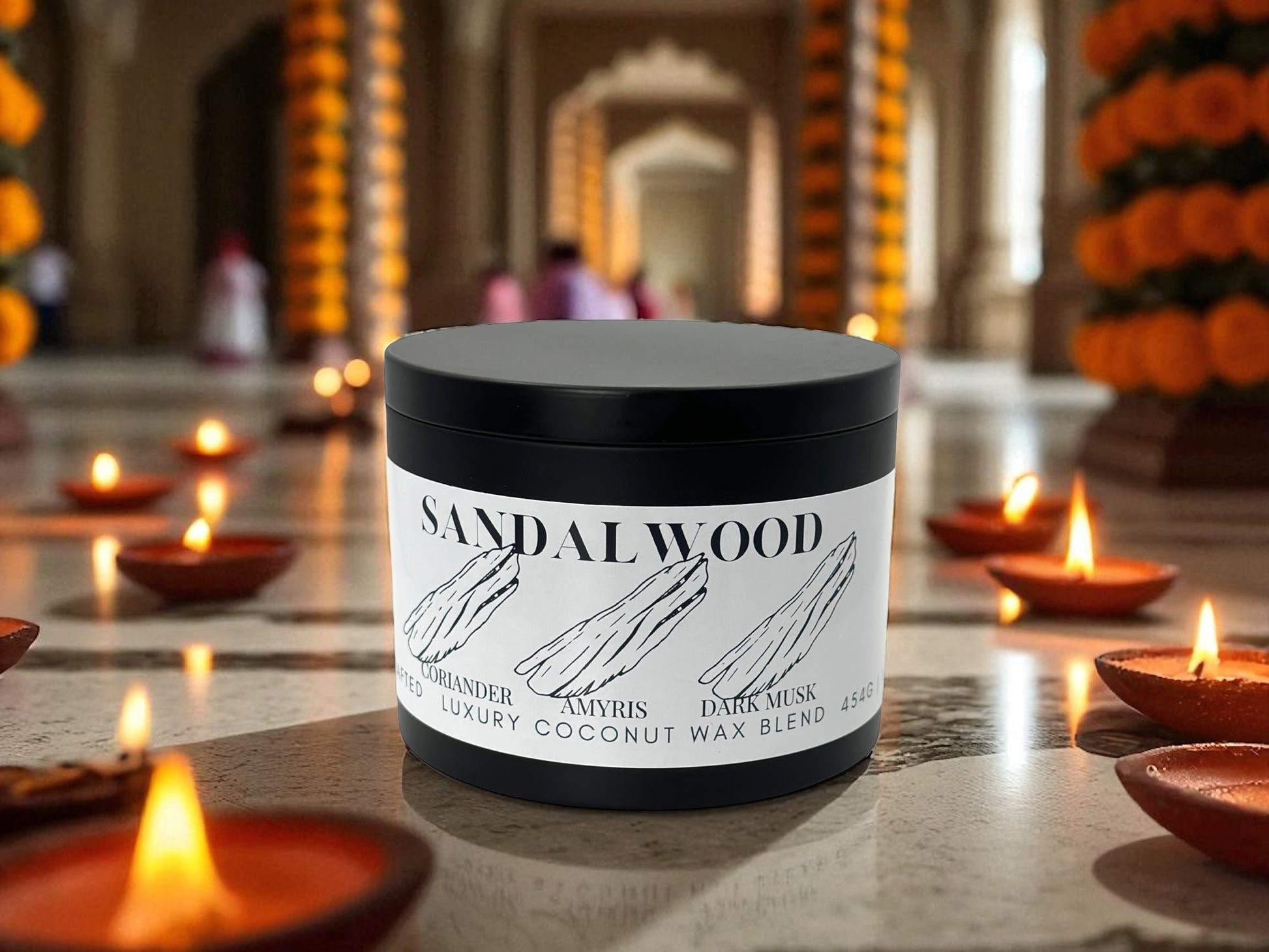 A black candle tin labeled sandalwood on a background with Diwali decorations.