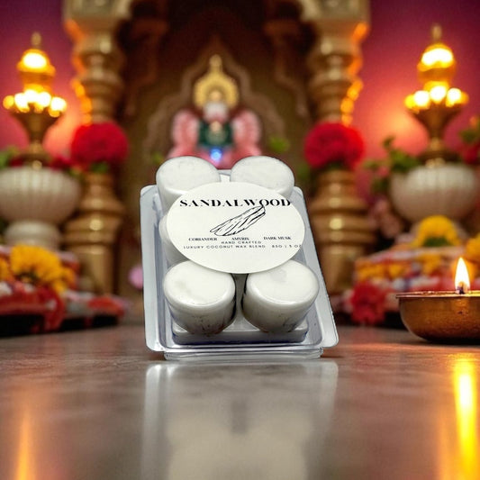 White Coconut wax melt labeled "Sandalwood" with Diwali decorations in the background.