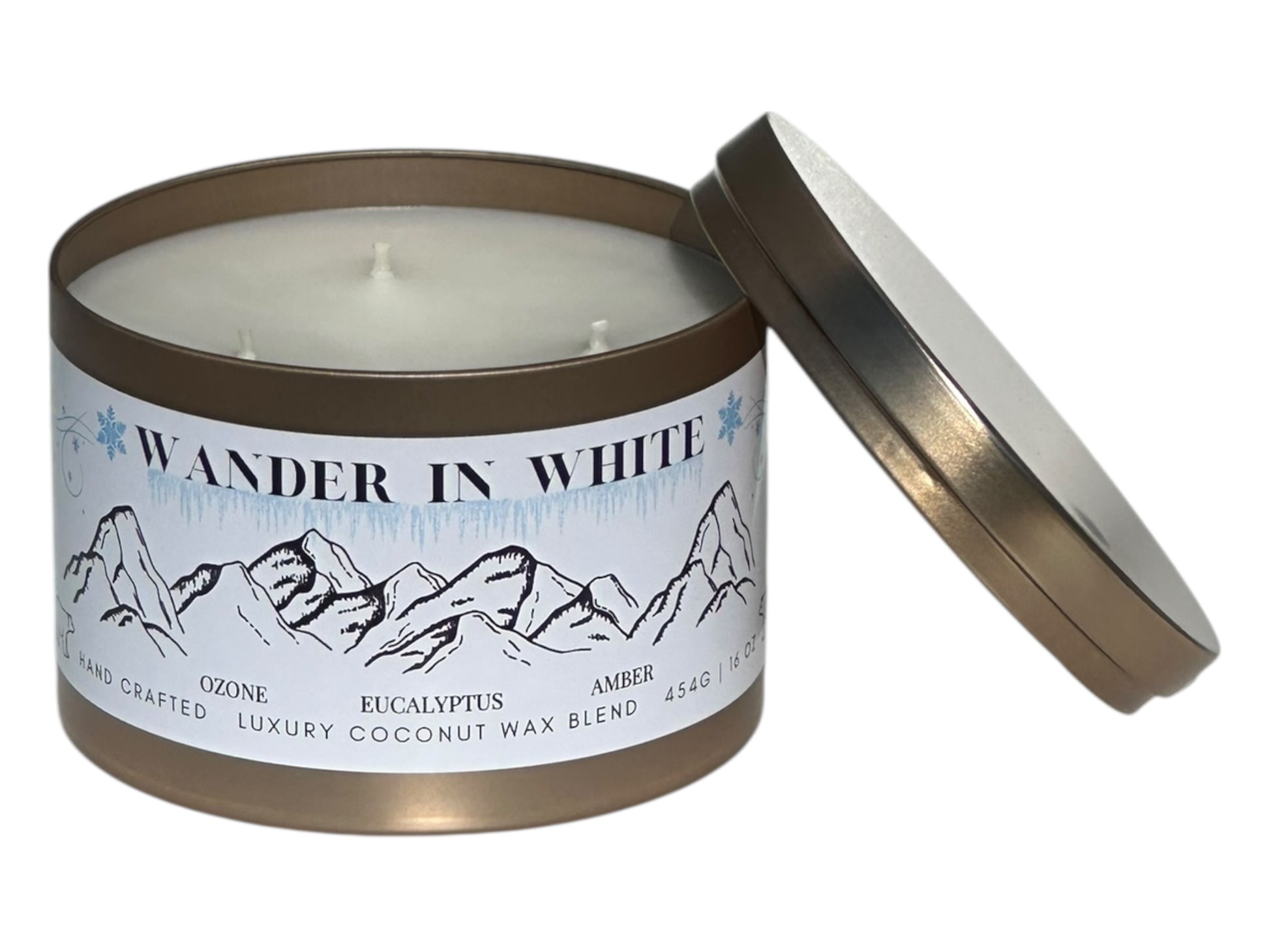 Candle in a tin with 'Wander in White' label on a white background