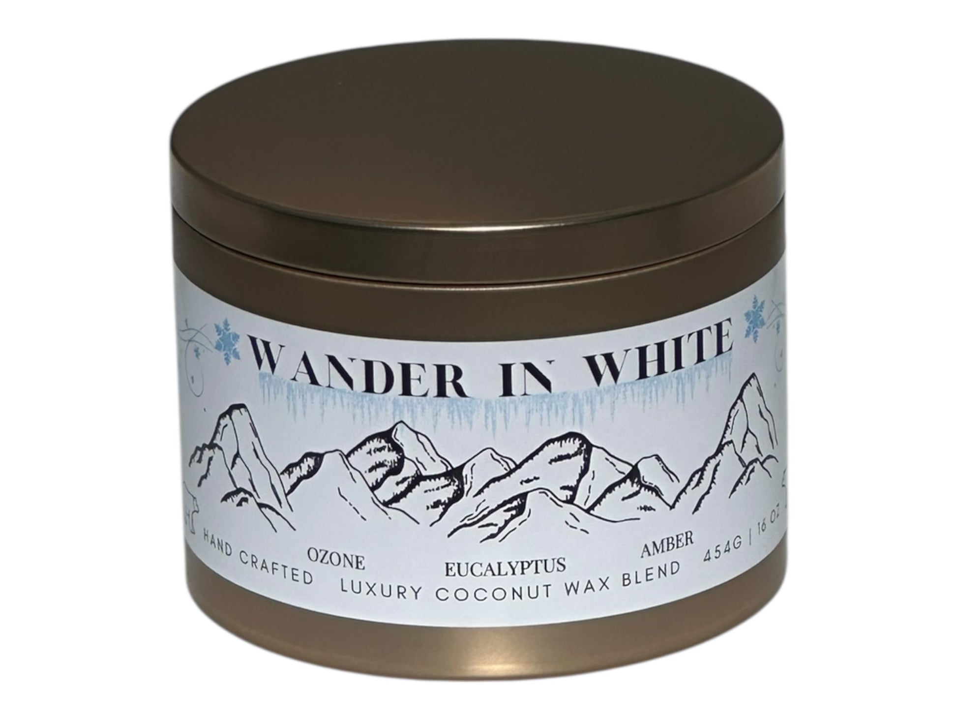 Candle jar with 'Wander in White' label featuring mountain design on a white background