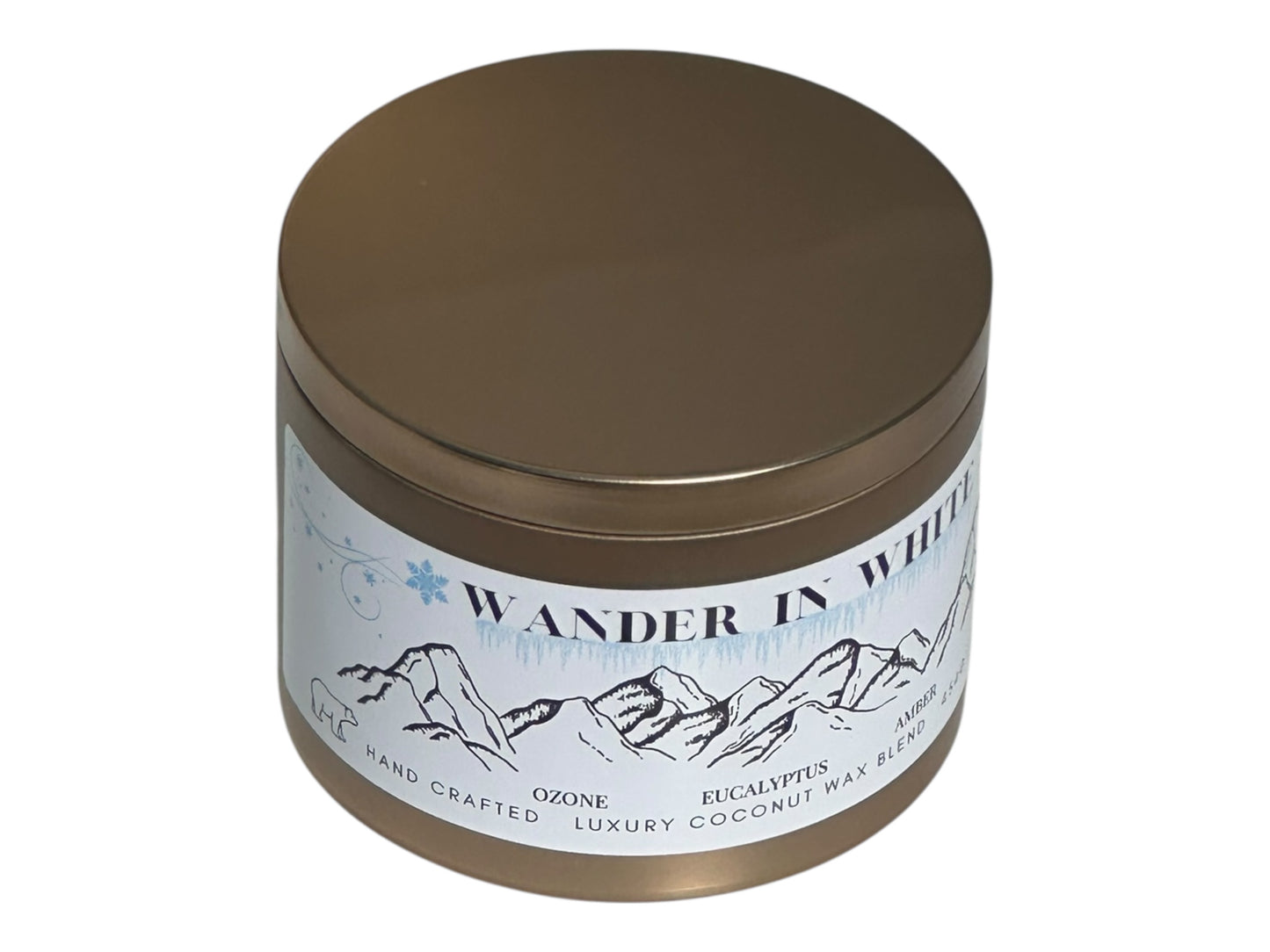 Gold Tin candle with 'Wander in White' label on a white background.