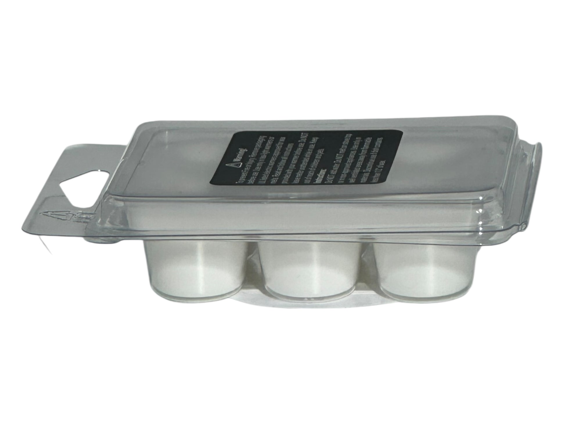 A winter wax melt labeled with safety information in a clear clamshell with a matte printed label on a white background.