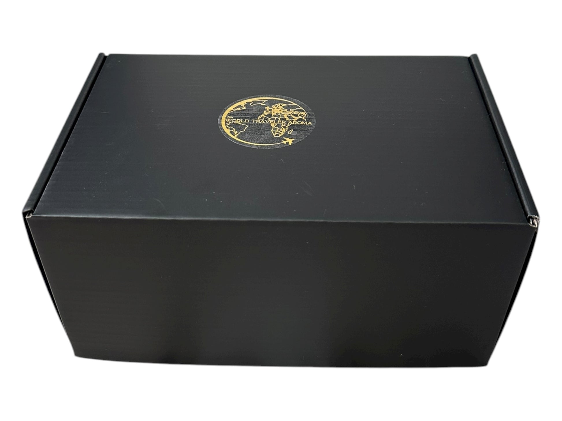 Black gift box with a gold World Traveler Aroma  logo on a white background